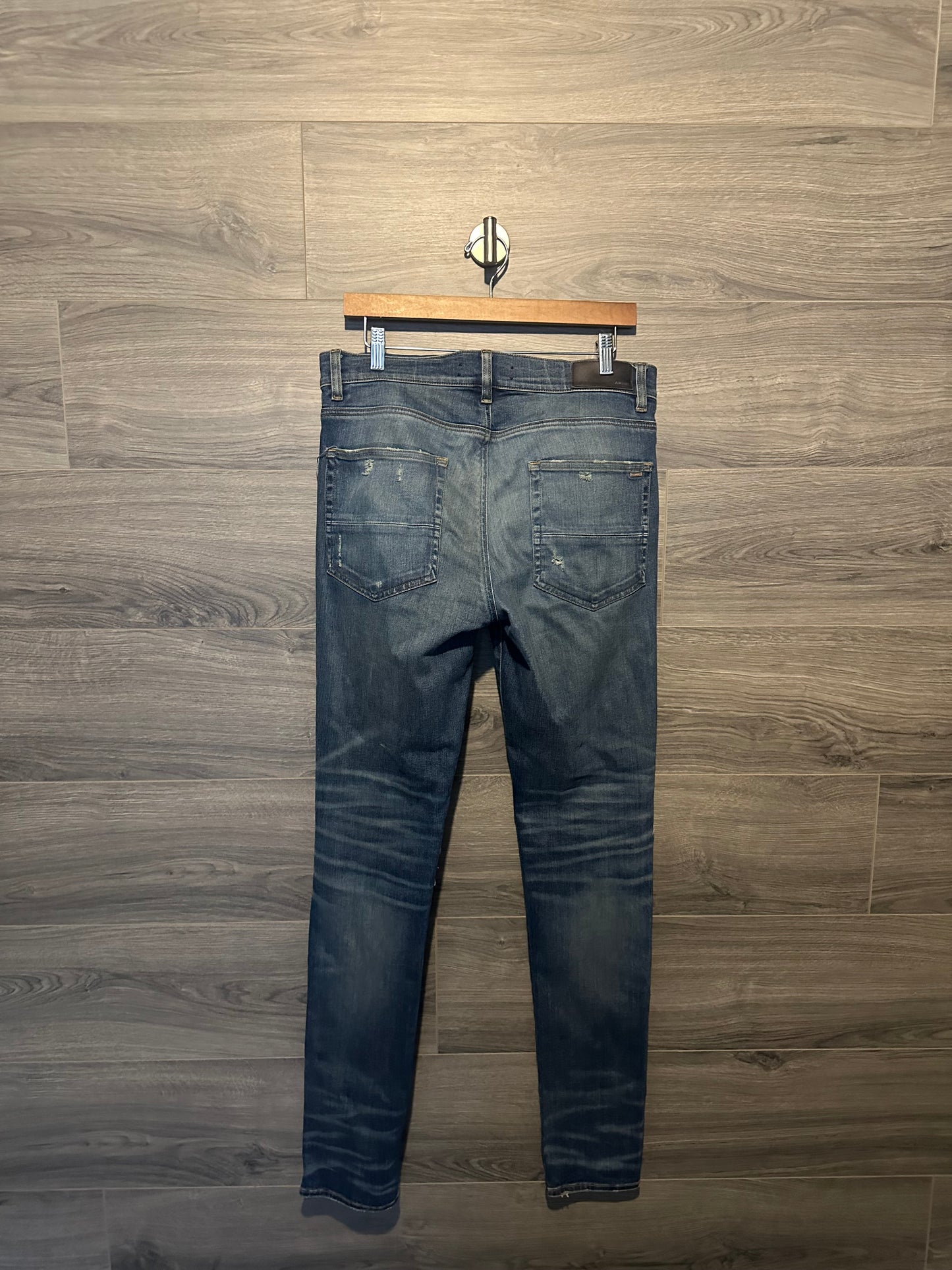 Amiri Mx1 “Black” Patch Indigo Jeans
