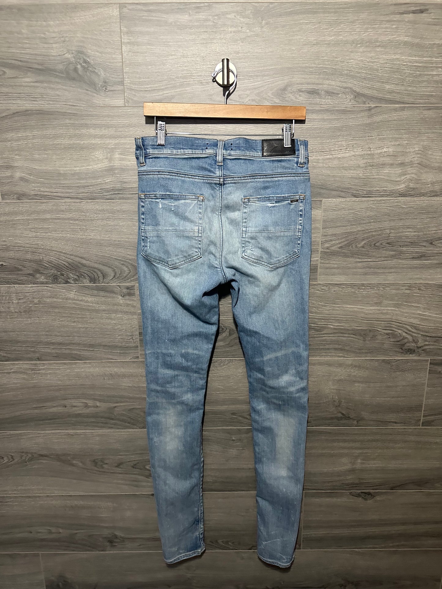 Amiri Mx1 “Black” Patch Lightwash Jeans
