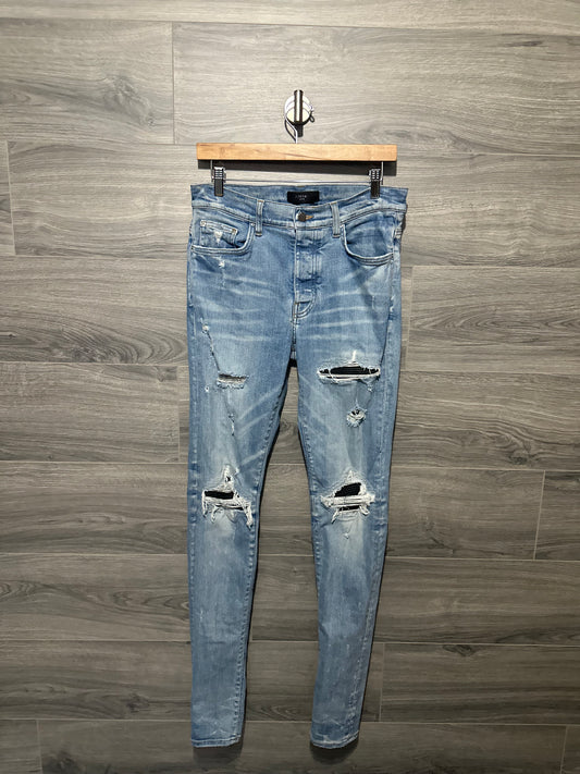 Amiri Mx1 “Black” Patch Lightwash Jeans
